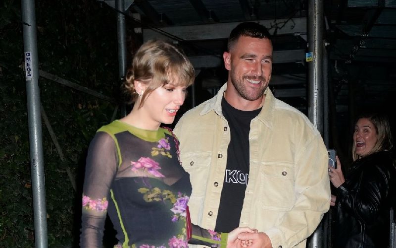 Taylor Swift and Travis Kelce Enjoy Elegant Date Night With Her Bandmates in Singapore