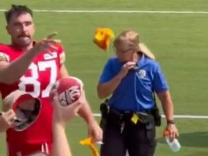 Travis Kelce Tosses Gloves to Taylor Swift Fan at Chiefs' Training Camp