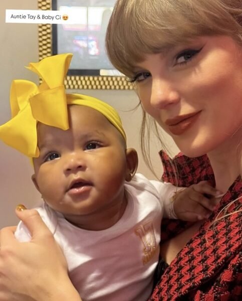 ‘Auntie’ Taylor Swift holds fellow WAG Chariah Gordon’s baby in sweet photo at Chiefs game